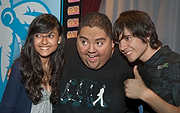 188-SBCF10-6590 - South Beach Comedy Festival comedian Gabriel Iglesias poses with some of the hundreds of fans he spent several hours with greeting them all personally at The Fillmore Miami Beach
