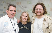 FIU-FriFoodPrep-6888 - FIU Professor Chef Michael Moran, left, with Jory Emde, center, assistant to Chef Zak Pelaccio, right, while preparing for the South Beach Wine and Food Festival at the Miami Beach Convention Center kitchen.