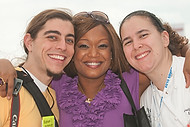 FIU-0473-WF104301 - Celebrity Chef Sunny Anderson, center, with FIU School of Hospitality students Nathan Valentine, left, and Bianca Rojas at the Grand Tasting Village at the 2010 South Beach Wine & Food Festival