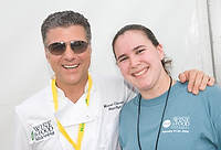 FIU-Grd-Taste-0263 - Napa Style celebrity chef Michael Chiarello and FIU School of Hospitality Student Bianca Rojas in the Grand Tasting Village at the 2008 South Beach Wine and Food Festival in Miami Beach.
