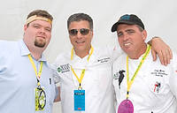 FIU-Grd-Taste-0268 - FIU School of Hospitality student Kevin Kohler, left, Napa Style celebrity chef Michael Chiarello and FIU School of Hospitality Professor Chef Michael Moran in the Grand Tasting Village at the 2008 South Beach Wine and Food Festival in Miami Beach.