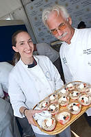 FIU-Grd-Taste-0304 - Elizabeth Erwin and Professor Chef Roger Probst in the Grand Tasting Village at the 2008 South Beach Wine and Food Festival in Miami Beach.