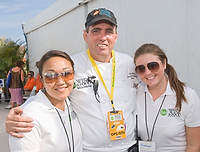 FIU-Grd-Taste-0318 - FIU School of Hospitality Students Angela Edwards, left, and Amber Maxwell, with their Professor Chef Michael Moran in the Grand Tasting Village at the 2008 South Beach Wine and Food Festival in Miami Beach.