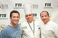 FIU-WF09-022186 - Chef Adam Perry Lang, FIU School of Hospitality's Chef Michael Moran and Chef Chris Lilly at the Miami Beach Convention Center kitchen.