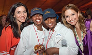 FIU-WF09-022791 - FIU School of Hospitality students with CBS4's weatherwoman Lissette Gonzales, left, and Food Network Chef Ingrid Hoffman at the Burger Bash.
