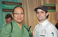 FIU-WF09-032985 - Chef Masaharu Morimoto and FIU School of Hospitality student Nick Starling at Best of the Best.