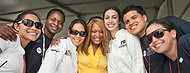 FIU-WF09-054125 - Food Network Celebrity chef Sunny Anderson, center, and FIU School of Hospitality's students at the Grand Tasting Village.