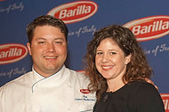 FIU-WF09-054174 - FIU School of Hospitality student and 2009 Barilla Best New Student Chef Award winner Arthur Mindermann and Barilla Senior Marketing Associate Angie Goldberg at the Interactive lunch at the Biltmore Hotel in Coral Gables.