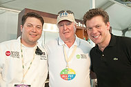 FIU-WF09-054219 - Food Network Celebrity Chef Tyler Florence, right, congratulates FIU School of Hospitality student and 2009 Barilla Best New Student Chef Award winner Arthur Mindermann. FIU SOH Dean Joe West is in the center at the Grand Tasting Village.