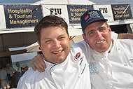 FIU-WF09-054365 - FIU School of Hospitality's student and 2009 Barilla Best New Student Chef Award winner Arthur Mindermann and Chef Michael Moran at the Grand Tasting Village.