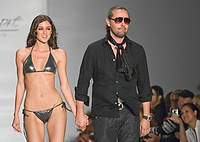 10CaneRum-3761 - Designer/model Caroline D'Amore, left, and Laurent Planeix fashion designer for D'Amore by Marceau at FUNKSHION 2008 Fashion Week Fall/Winter collections in Miami Beach, Florida Saturday, March 29, 2008. (Photo by 10 Cane Rum/Mitchell Zachs)