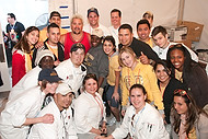 FIU-0547-WF105757 - Celebrity Chef Guy Fieri, top left with blond hair,  requested a group picture i the kitchen after he congratulates FIU School of Hopitality students and staff on a job well done in the kitchen at the Grand Tasting village of the 2010 South Beach Wine and Food Festival.
