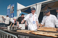 FIU-565-WF104915 - FIU School of Hospitality students/staff prep for guests at FIU SOH booth at the Grand Tasting Village of the 2010 South Beach Wine & Food Festival
