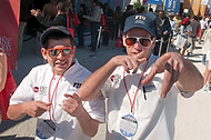 FIU-644-WF105306 - FIU School of Hospitality students/staff at or near FIU SOH booth at the Grand Tasting Village of the 2010 South Beach Wine & Food Festival