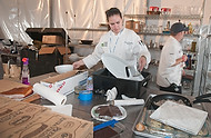 FIU-686-WF105636 - FIU School of Hospitality students in the kitchen at the Grand Tasting Village of the 2010 South Beach Wine & Food Festival