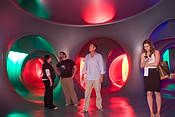 Luminarium-0189 - Harry Baxter, center, inside the Luminarium Levity III at Flamingo South Beach