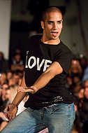 023-PeaceLoveWorldEdenRoc-3674 - So You Think You Can Dance season five competitor Kapono Aweau dances on the runway during the Peace Love World fashion show as apart of Rock Fashion Week at the Eden Roc Renaissance Miami Beach in Miami Beach.