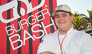 FIU-0195-WF10 - FIU School of Hospitality student volunteer Michael Vidal at the Burger Bash at the 2010 South Beach Wine & Food Festival