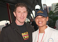 FIU-0211-WF10 - Celebrity Chef Bobby Flay and FIU School of Hospitality student Kimberly Coo at the Burger Bash at the 2010 South Beach Wine & Food Festival