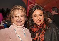 FIU-0240-WF10 - Celebrity Chef Rachael Ray, right, and FIU School of Hospitality and Tourism Management Interim Dean Joan Remington at the Burger Bash at the 2010 South Beach Wine & Food Festival