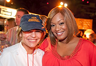 FIU-0258-WF10 - Celebrity Food Network Chef Sunny Anderson, right, and FIU School of Hospitality student volunteer Danielle Kelly at the Burger Bash at the 2010 South Beach Wine & Food Festival