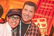 FIU-0259-WF10 - FIU School of Hospitality student volunteer Krystal Gonzalez with Celebrity Chef Michael Chiarello, of the Food Network at the Burger Bash at the 2010 South Beach Wine & Food Festival