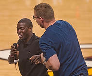 377-ZSG09-2686  Comedian Kevin Hart, left, wins the wrestle for the PA microphone against comedian Gary Owen