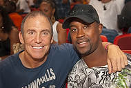 417-ZSG09-6529  Former NBA player Kenny Anderson, right, and friend