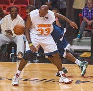 427-ZSG09-2902  Former Miami Heat player Zo Mourning and Denver Nugget Chris Paul