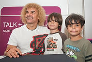 45-TMobileElPibe<br>Carlos Valderrama, left, and guests
