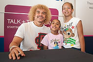 67-TMobileElPibe<br>Carlos Valderrama, left, and guests